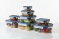 FlexMeal Prep Container Set – 7 glass meal prep containers on white background